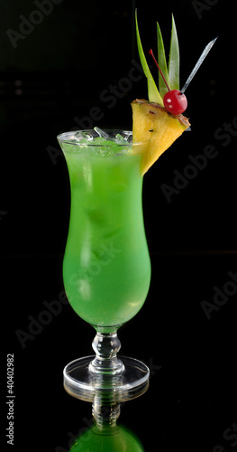 green cocktail with pineapple