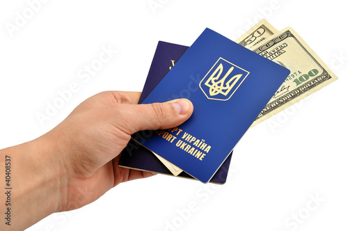 passports and dollars photo