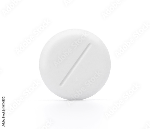 Macro shot of white pill isolated on white background