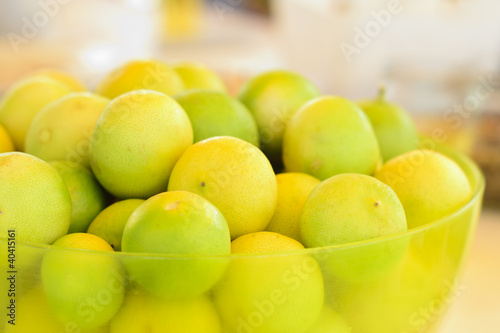 South American Limes -Tropical limes in a transparent green bowl