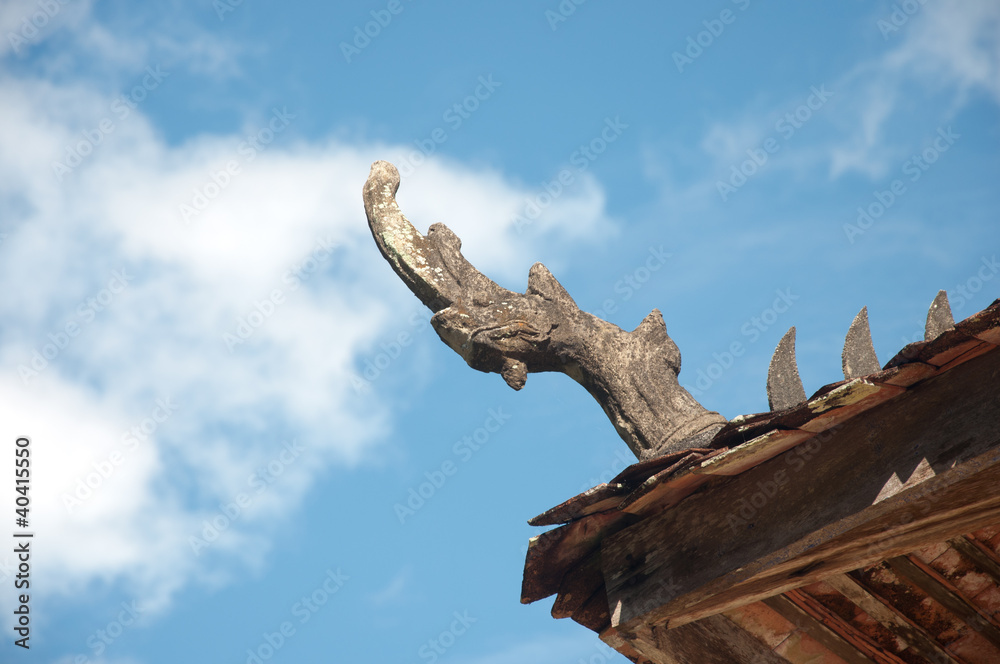 King of Naga statue on roof of thai temple