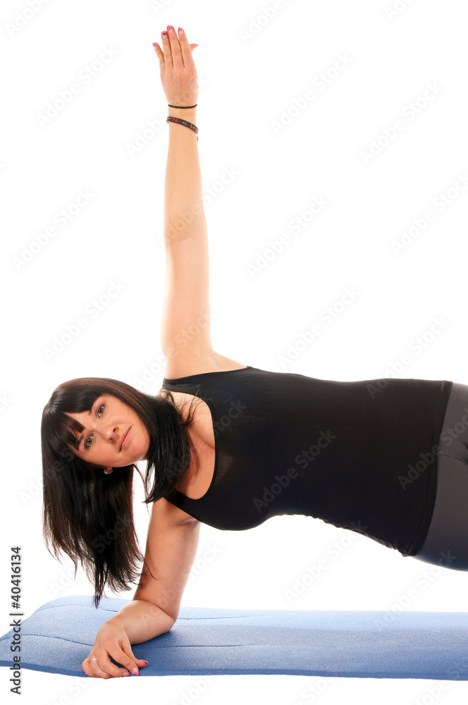 attractive sporty girl makes gymnastics