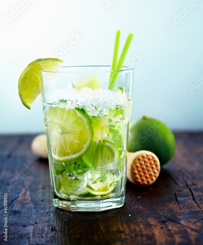 Refreshing drink with fresh lime slices
