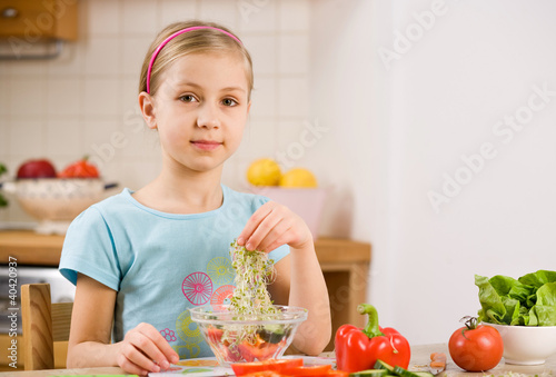 girl making salad