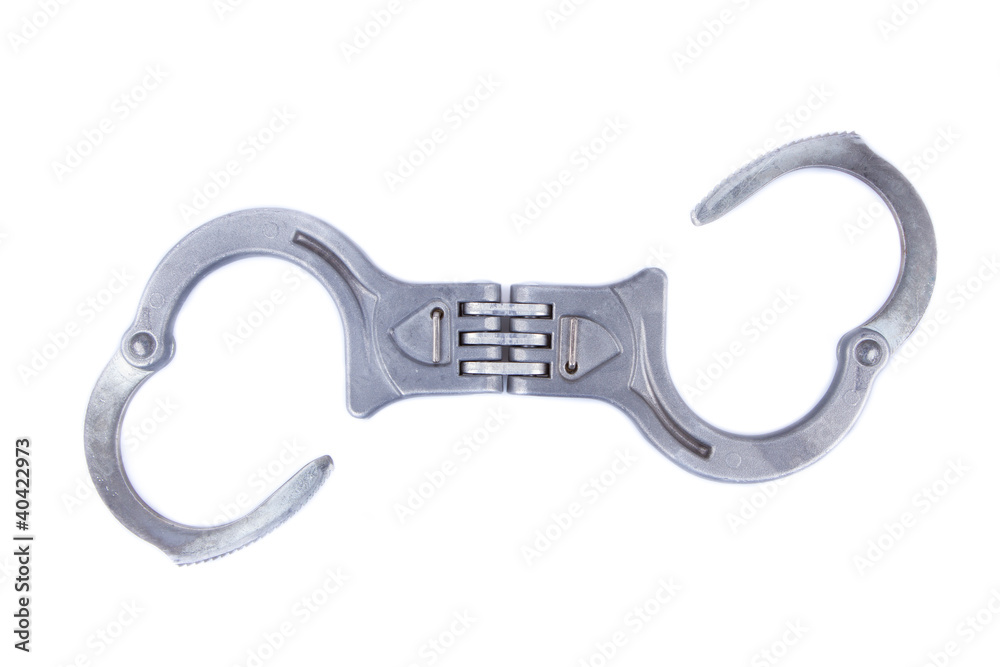 Metal handcuffs isolated on a white background