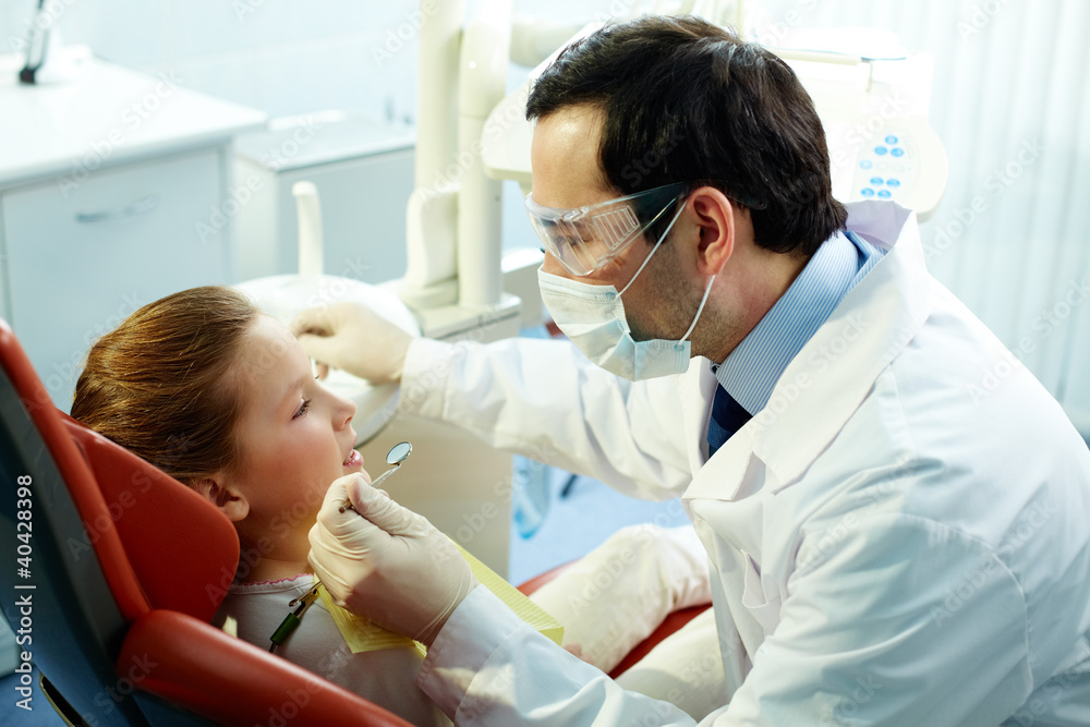 Dentist and patient Dentist and patient