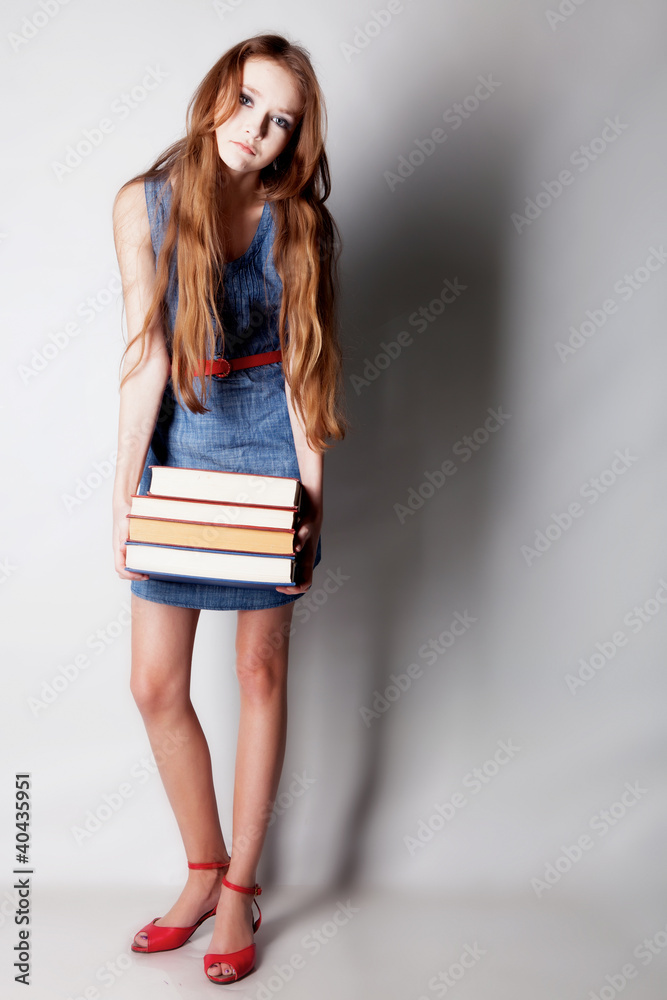 Fototapeta premium Girl with books