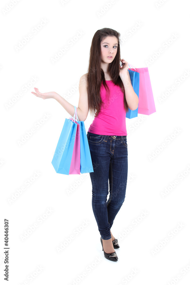 teenager in pink t-shirt with shopping bags teenager in pink t-shirt with shopping bags