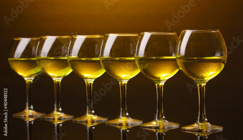 Wineglass on brown background