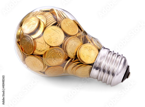 фотографія Traditional glass bulb with many golden coins