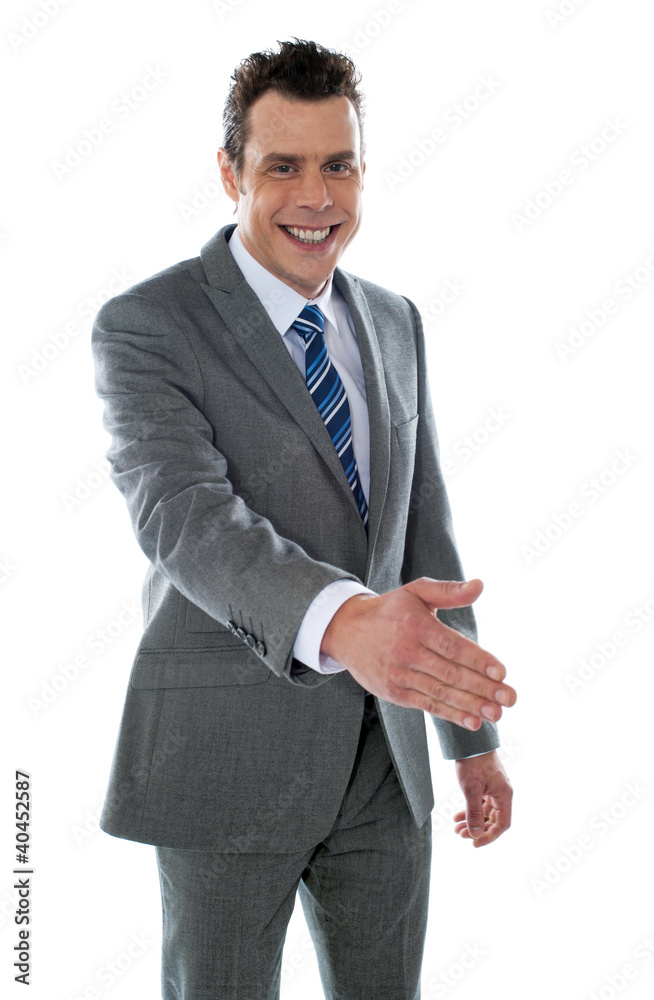 Confident modern businessman offering handshake Confident modern businessman offering handshake