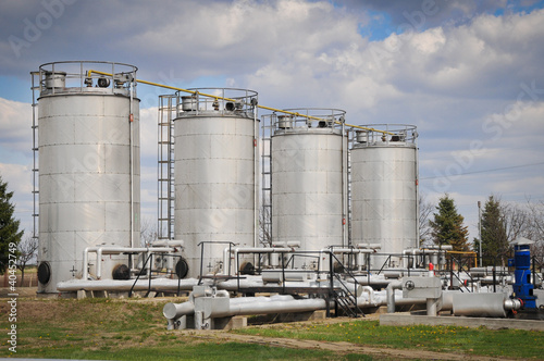 Greater white fuel tanks on a background of the blue sky
