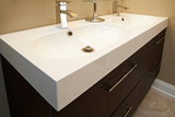 Modern bathroom with stainless steel fixtures.