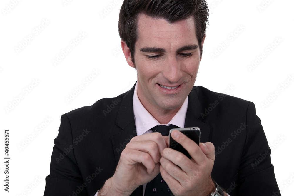 businessman having fun with his smart phone businessman having fun with his smart phone