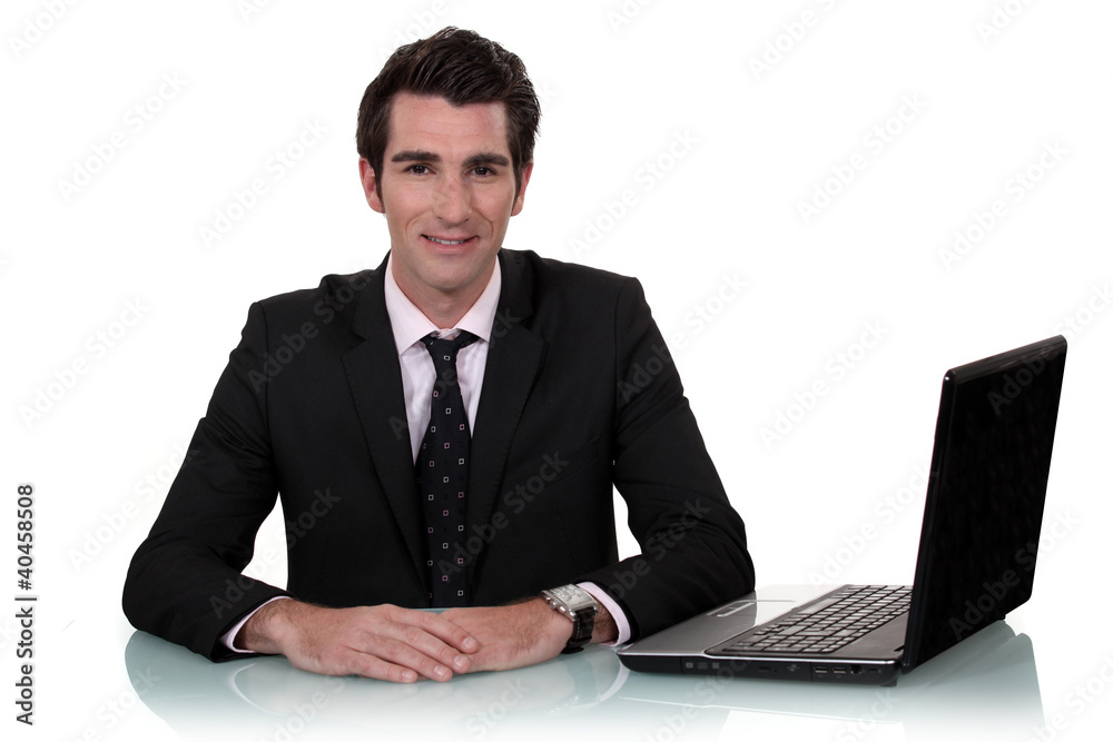Executive with computer on the table Executive with computer on the table