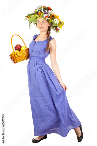 Beautiful girl with flowers and apples