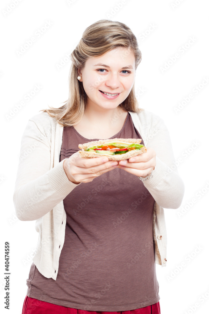 Happy woman holding sandwich