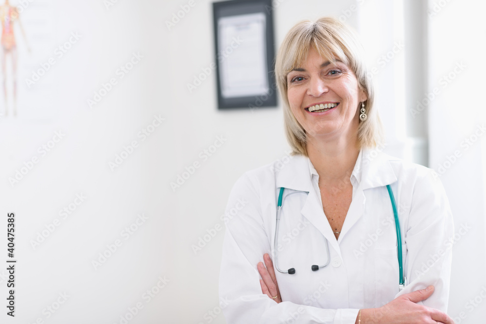 Portrait of smiling middle age doctor Portrait of smiling middle age doctor