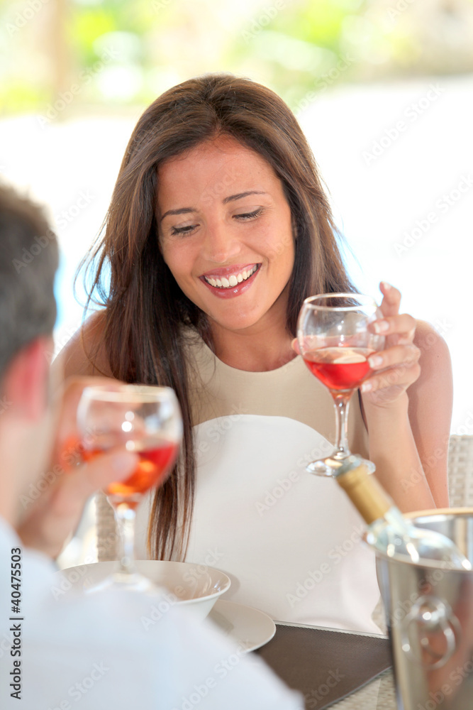 Portrait of attractive woman drinking wine in restaurant Portrait of attractive woman drinking wine in restaurant