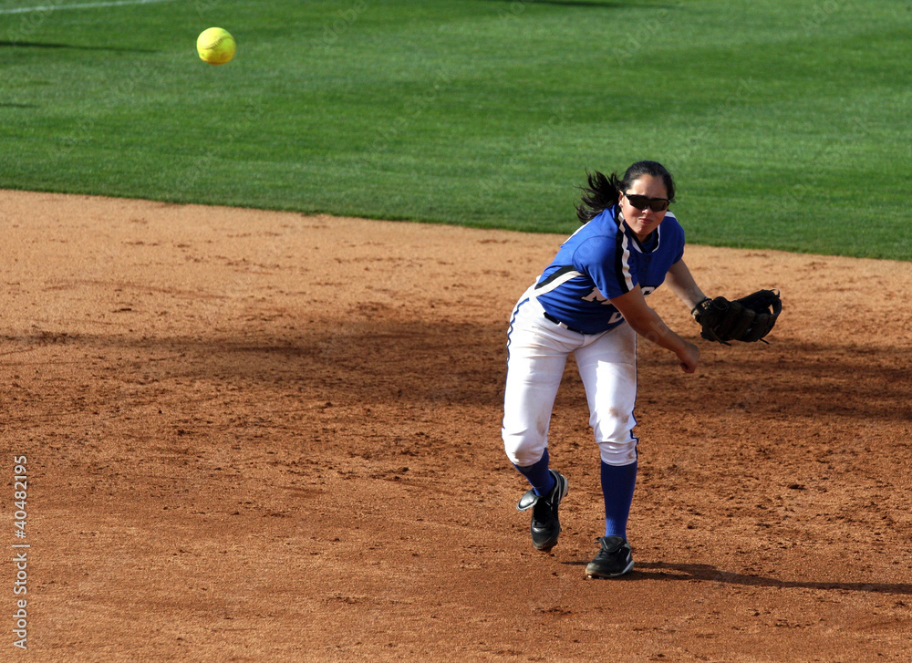 Softball Player Throwing Ball Softball Player Throwing Ball