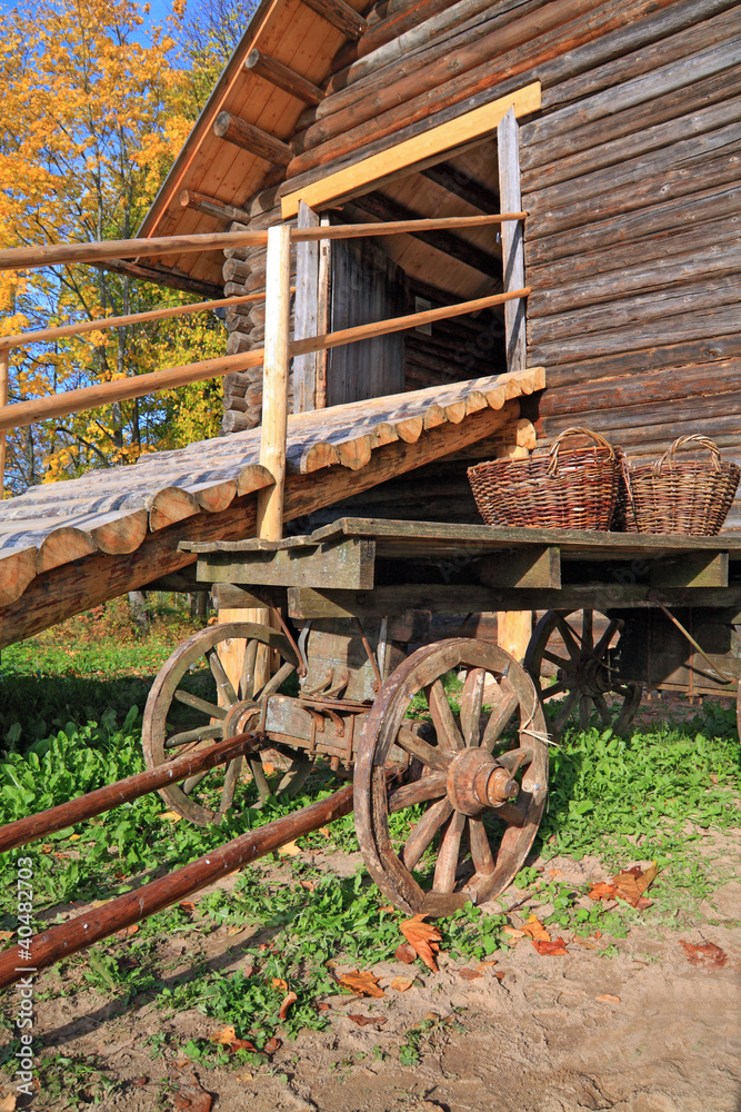 Fototapeta premium aging cart near rural stable