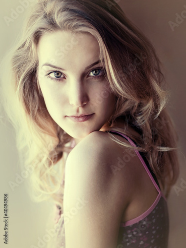 Creative portrait of a beautiful blonde closeup