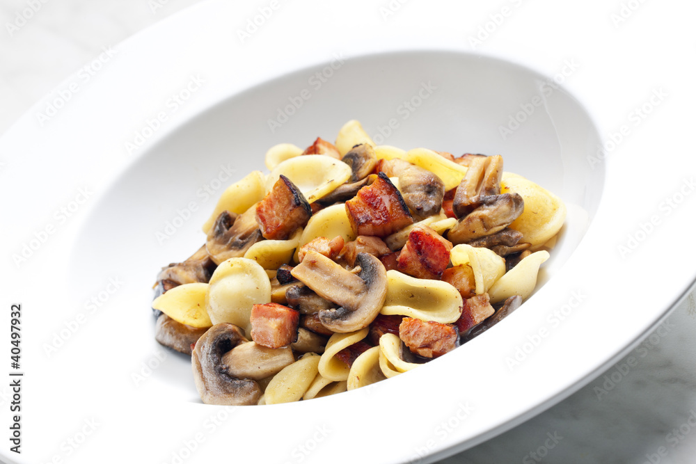 pasta orecchiette with fried champignons and bacon pasta orecchiette with fried champignons and bacon