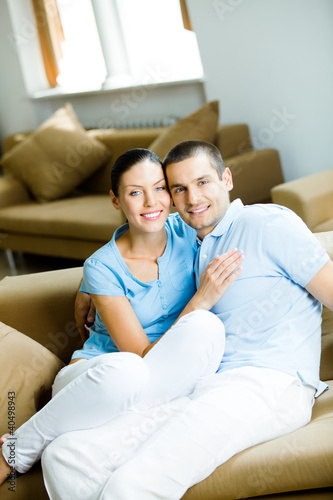 Young happy couple at home