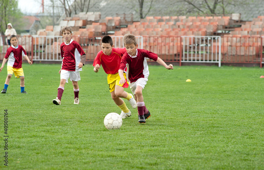 boy kicking ball boy kicking ball