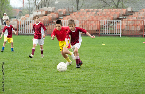 boy kicking ball © Dusan Kostic