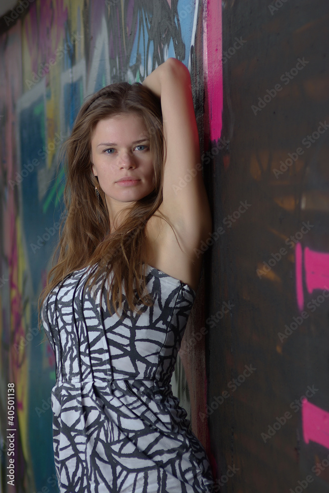 Girl against graffiti background