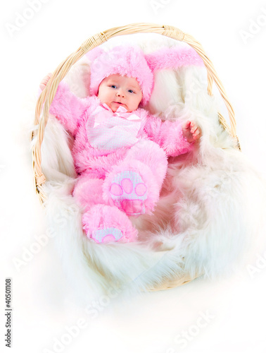 funny newborn baby dressed in Easter bunny