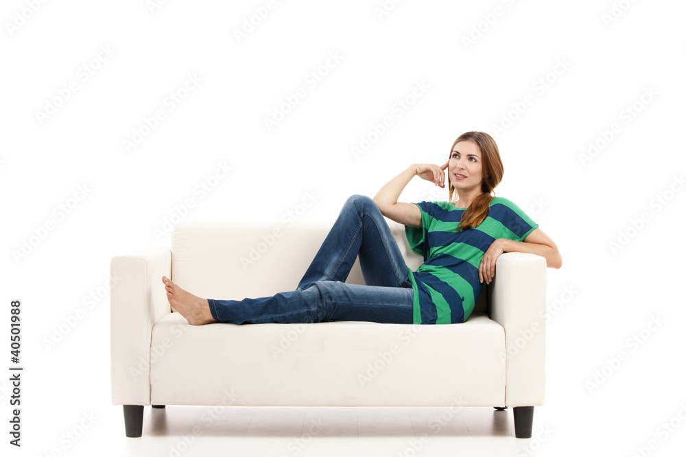 Obraz premium Woman at the sofa thinking