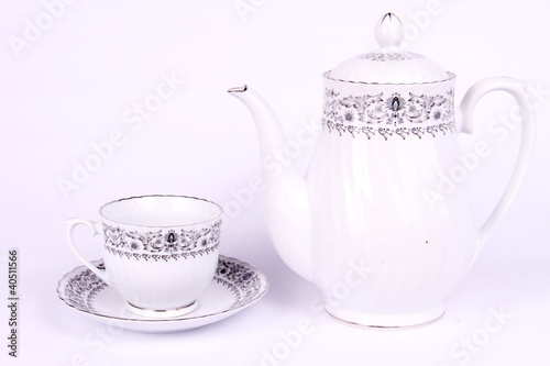 tea cup and tea pot isolated white background