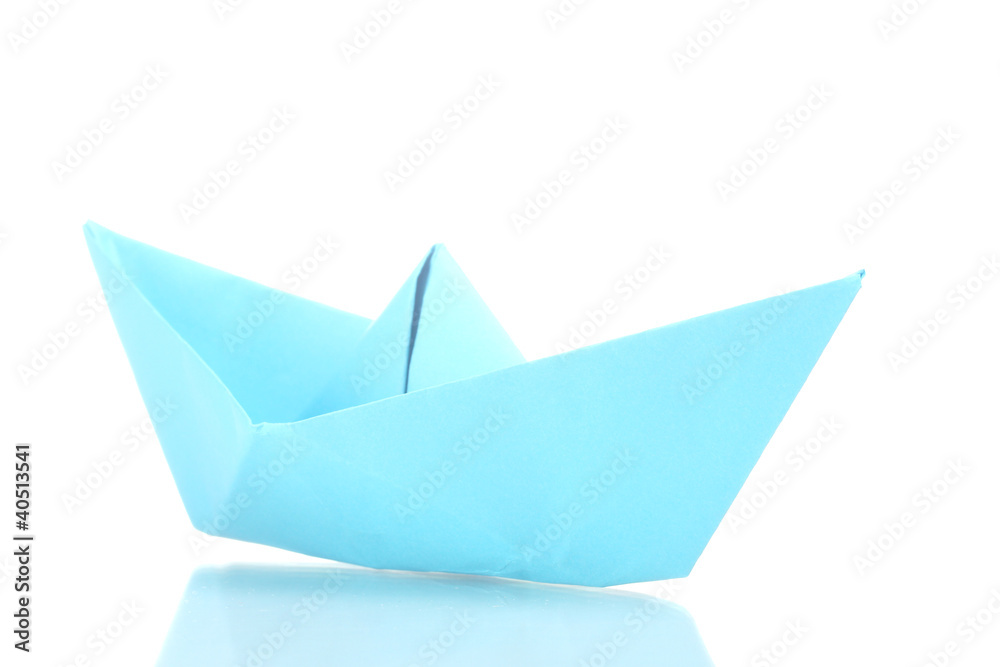 Origami boat out of the blue paper isolated on white