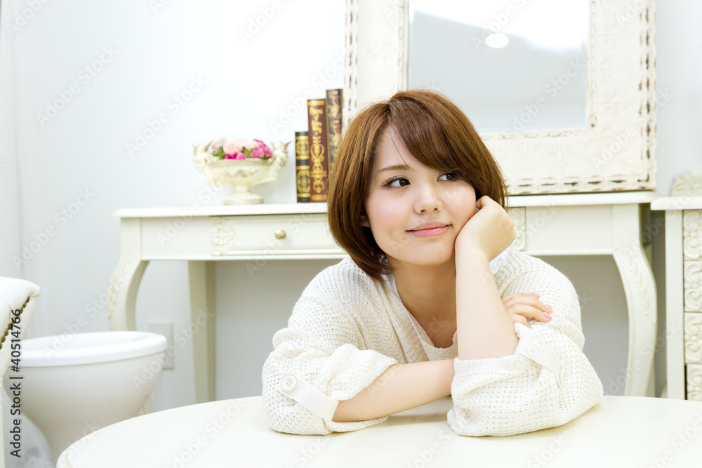 Beautiful young woman relaxing in the room Beautiful young woman relaxing in the room