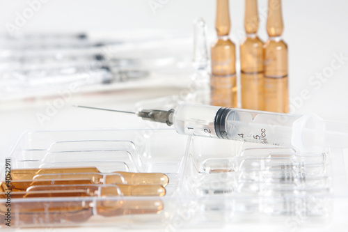 Close-up shot of syringe and vials