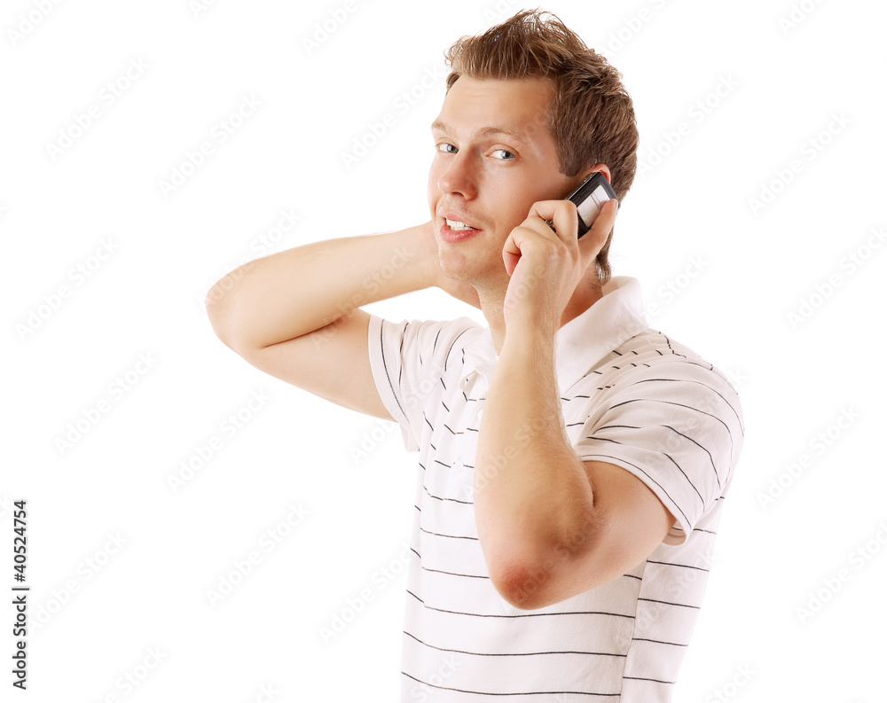 A handsome man is talking on phone on white background