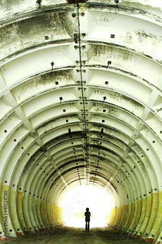 Obraz na płótnie A Figure in a Tunnel