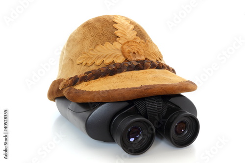 traditional hat and binoculars