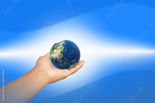 The earth in blue background