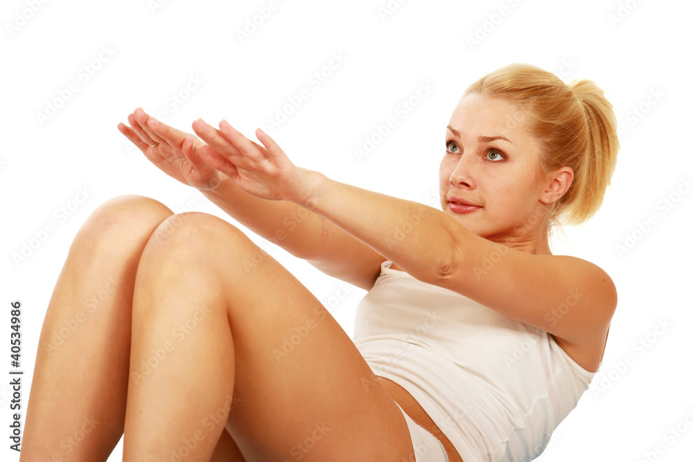Fototapeta premium Woman doing strength exercises for abdominal muscles