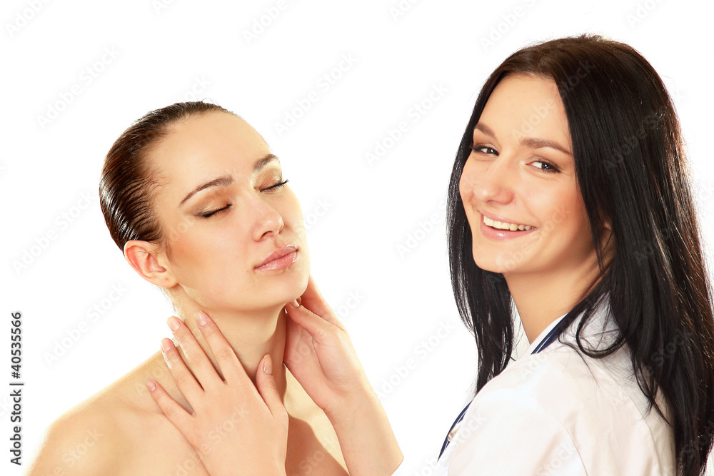 Cosmetic medicine, a smiling doctor and a patient on white Cosmetic medicine, a smiling doctor and a patient on white