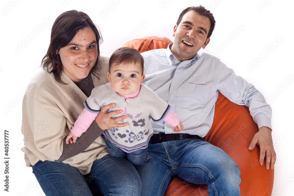 Happy family of parents and daughter in causal clothes Happy family of parents and daughter in causal clothes