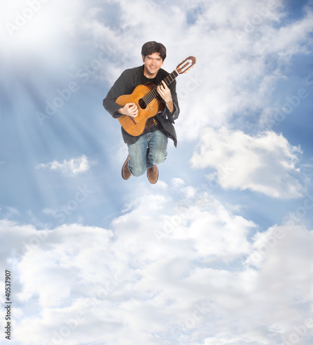 Guitarist Jumping in the Clouds