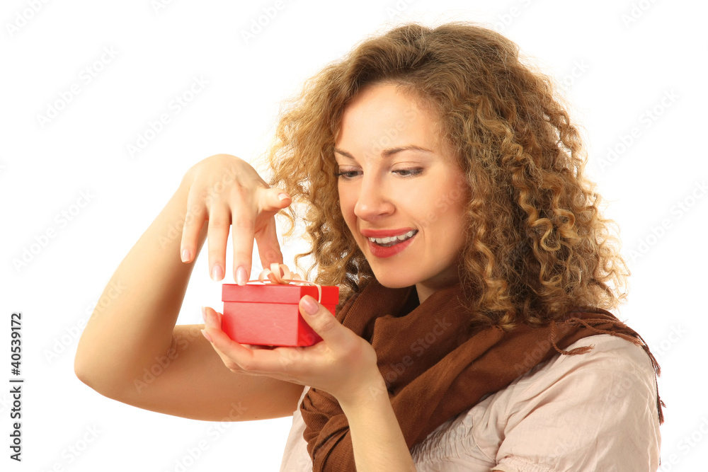 Beautiful surprised woman holding gift with ribbon Beautiful surprised woman holding gift with ribbon