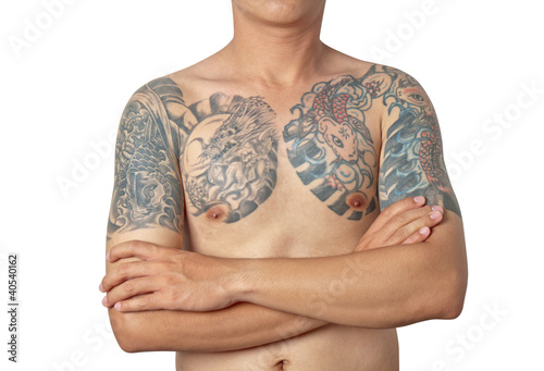 Asian guy with a tattoo posing