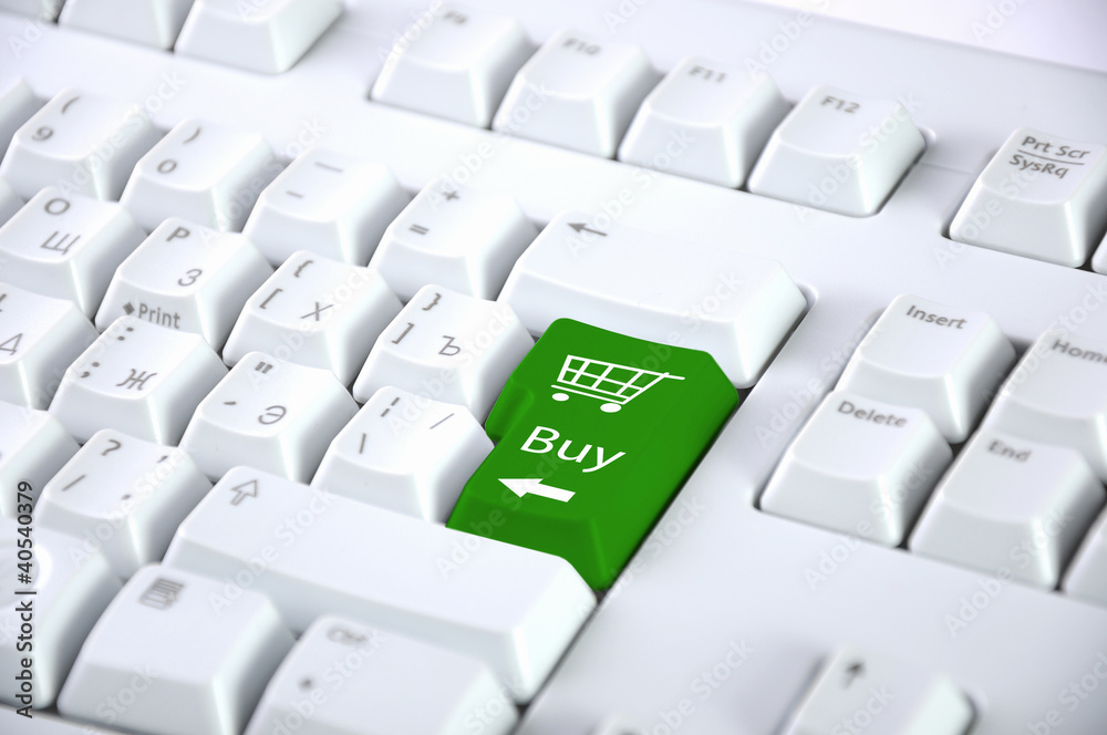 Computer keyboard with on-line shopping symbol Computer keyboard with on-line shopping symbol