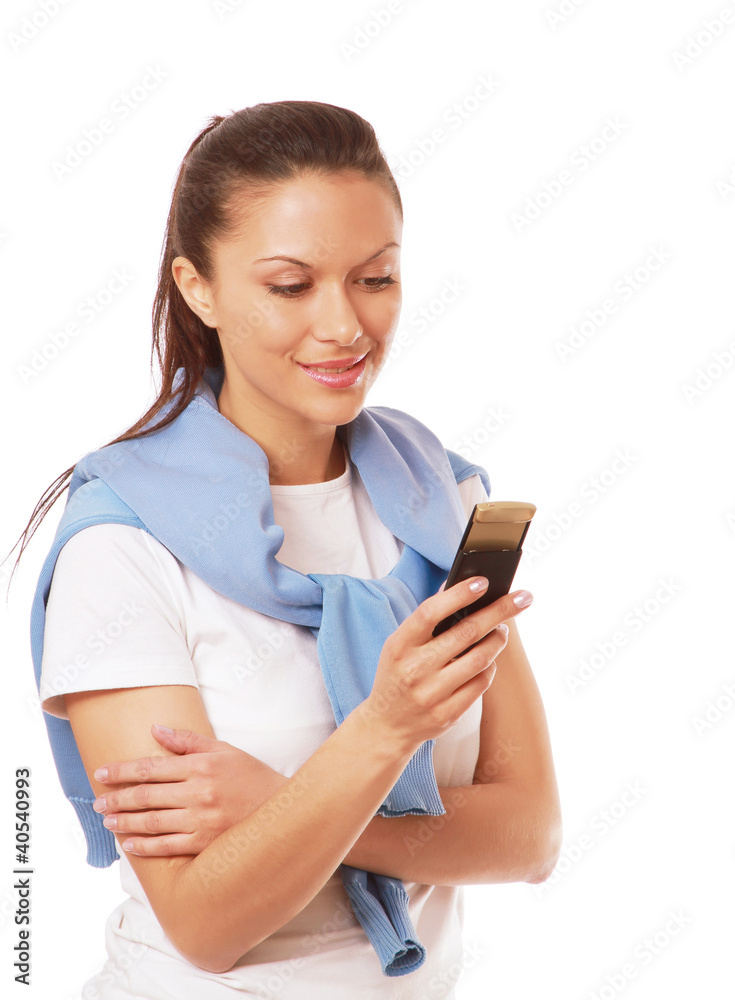 A young woman with a mobile phone, isolated on white A young woman with a mobile phone, isolated on white