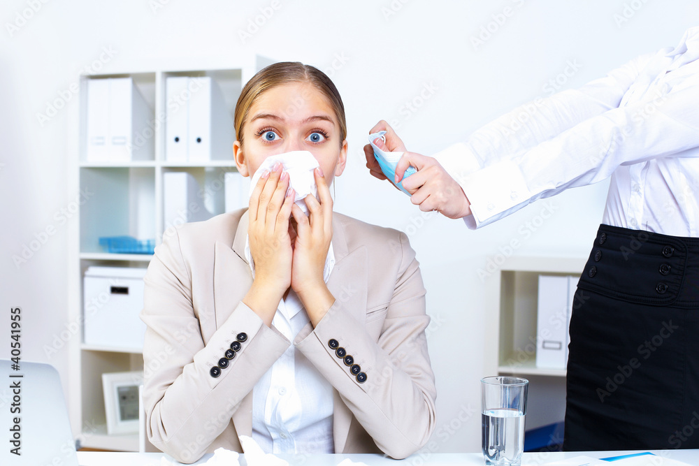 People with cold and flu at work place People with cold and flu at work place